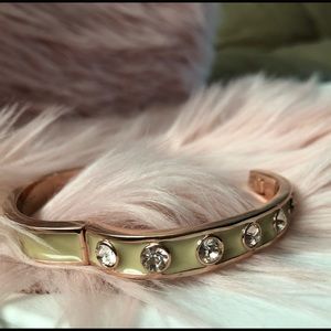 Rose gold and cream Givenchy hinged bangle